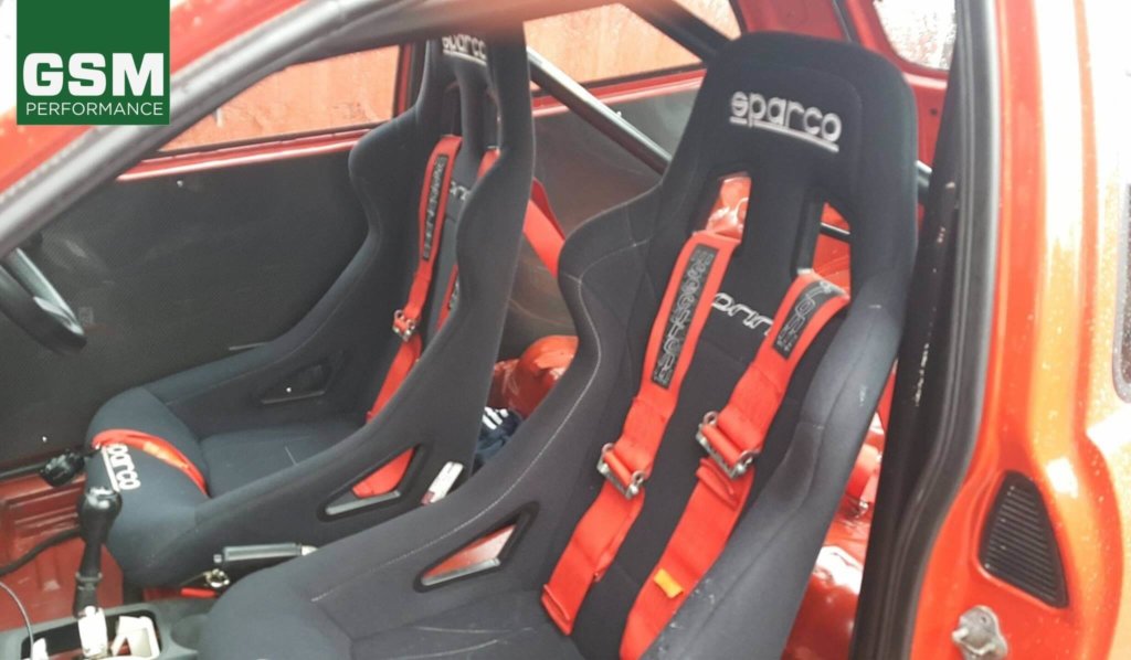 Sparco Sprint Bucket seats with red harnesses